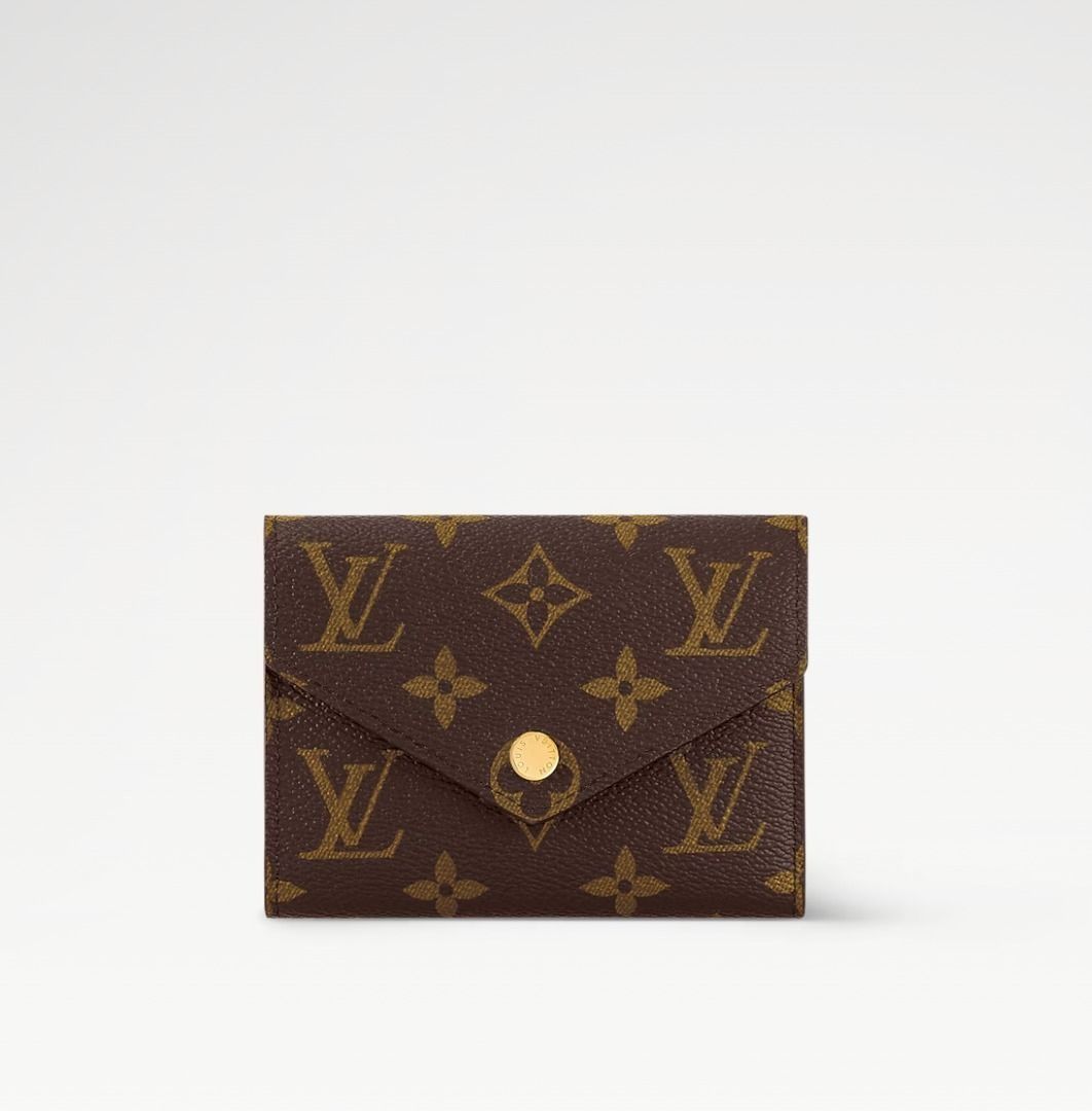 Louis Vuitton Victorine Wallet (Monogram) (Category: Luxury Bags & Wallets) located in Manila. Submitted by loverose7 (Listing ID 1378465628, Image 1). Description: ✨ Pre-Loved & Authentic! ✨ 🤎 Louis Vuitton Victorine Wallet – M62472 (Monogram) ✅ 100% Original | Purchased in Singapore 🎁 Comes with Box & Dust Bag The compact Victorine wallet in Monogram canvas combines femininity and functionality. It opens out to reveal many practical features,