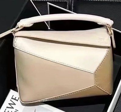 Mini sling bag (Category: Cross-body Bags) located in Singapore. Submitted by lilwhisperer (Listing ID 1378456387, Image 1). Description: Brand new with box DM for more info - I have other bags, items and designs as well.