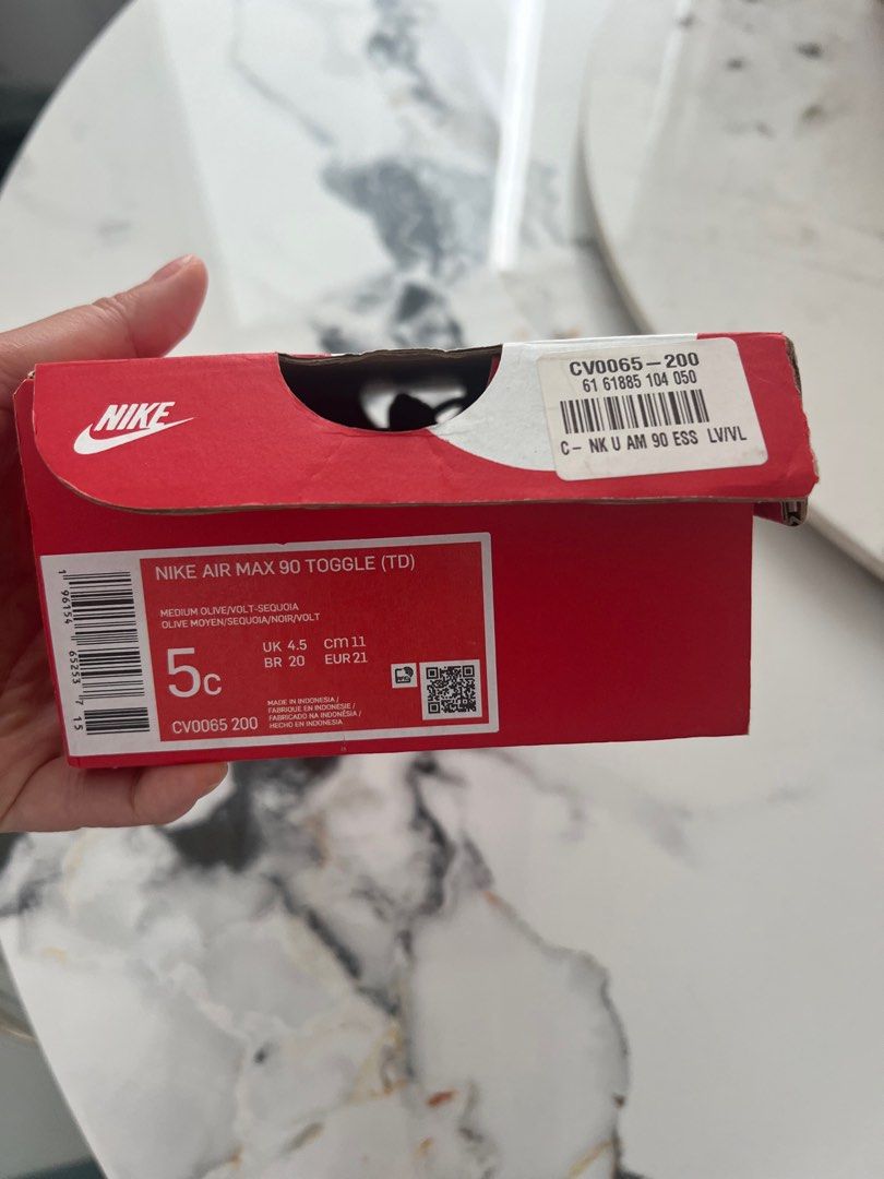 Nike Air Max 90 for baby size 5C (Category: Babies & Kids Fashion) located in Singapore. Submitted by loongstoryshort (Listing ID 1376486071, Image 2). Description: Nike Air Max 90 ESS sneakers for infants. Olive green with neon yellow accents. Worn few times. Size 5C. Pickup from 439958 with box. Retails $100+.