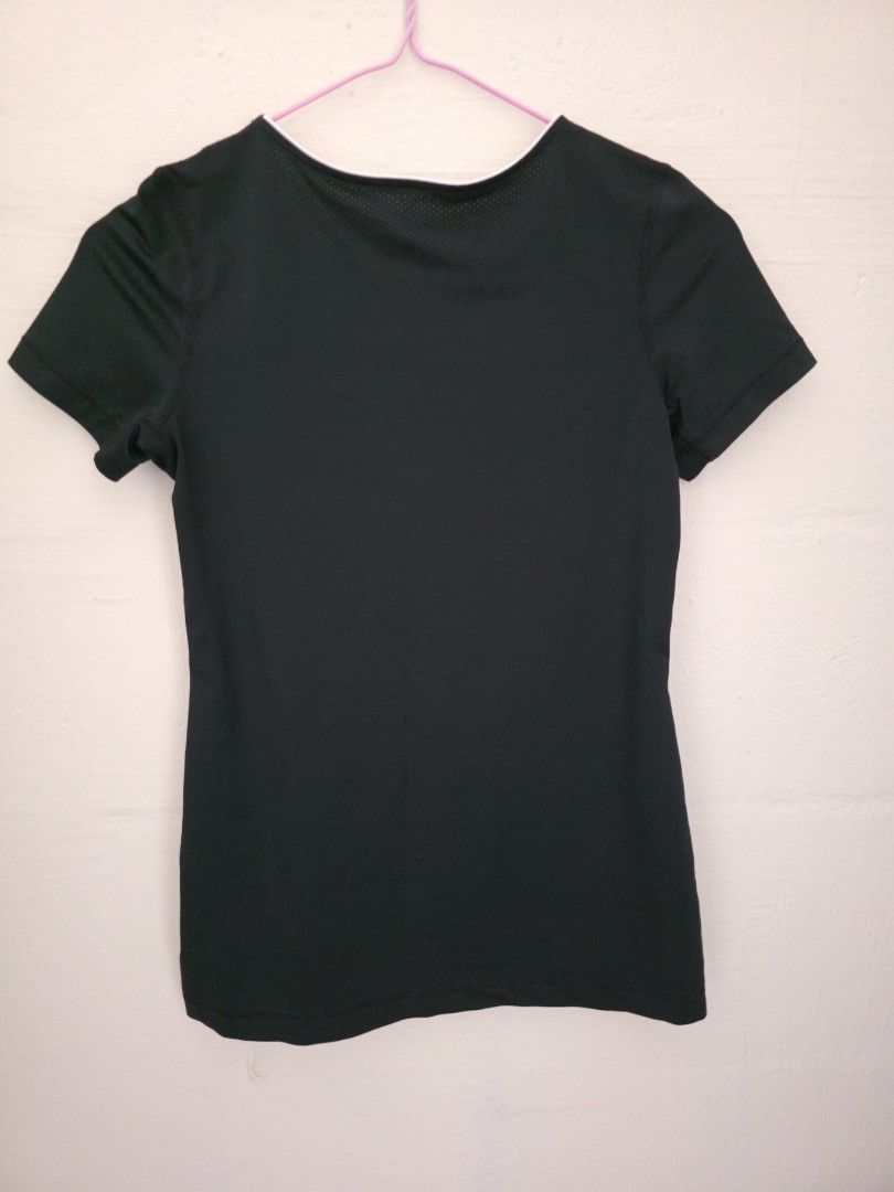 Nike Dri-FIT Black T-Shirt (Category: Activewear) located in Singapore. Submitted by tsy23 (Listing ID 1378360101, Image 2). Description: - Black Nike Dri-FIT t-shirt - White Nike logo - White trim around neckline - PTP 38cm, length 59cm.