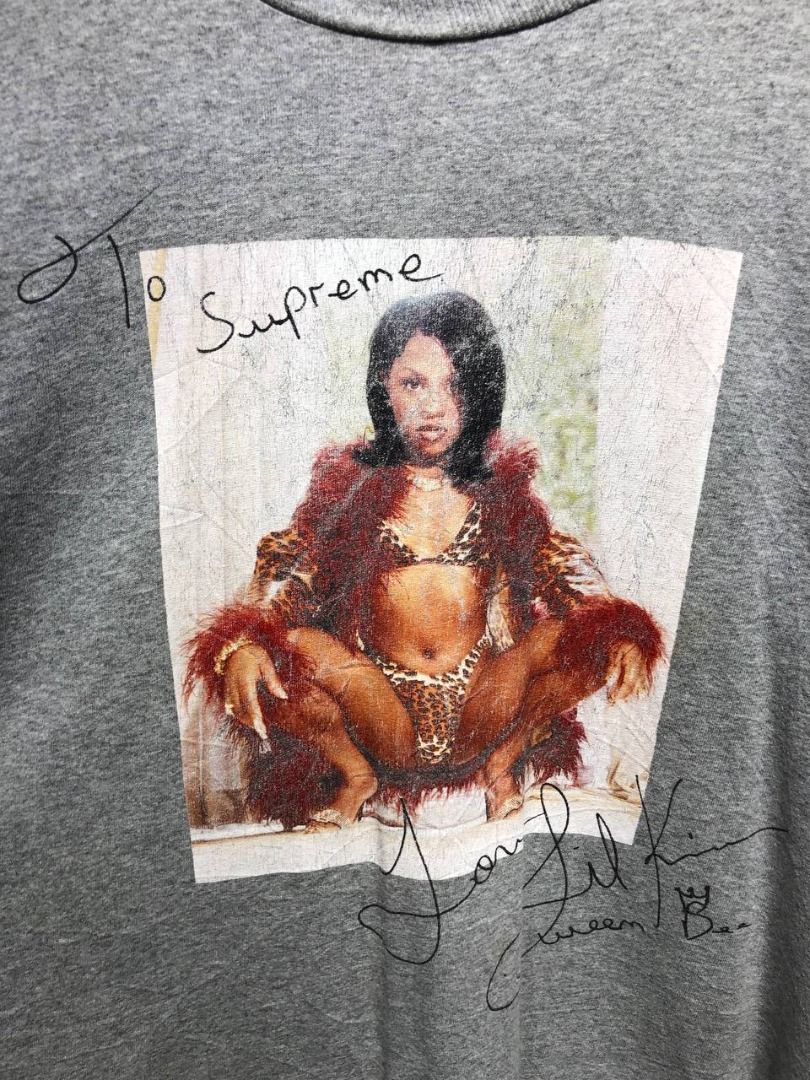 Supreme Lil Kim tee (Category: Luxury Apparel) located in Quezon City. Submitted by johnpaulperezzz (Listing ID 1378383852, Image 2). Description: NAME: Supreme Lil Kim tee COLOR: Gray SIZE: XL on tag FIT: XXL Dimension: Width: 26 Length: 31 Shoulder: 23 Sleeves: 9 Hem: 27 CONDITION: 8/10 ISSUE: -crack print at the front of the tee -stain at the front print PRICE: 5k .