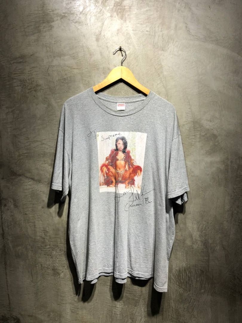Supreme Lil Kim tee (Category: Luxury Apparel) located in Quezon City. Submitted by johnpaulperezzz (Listing ID 1378383852, Image 1). Description: NAME: Supreme Lil Kim tee COLOR: Gray SIZE: XL on tag FIT: XXL Dimension: Width: 26 Length: 31 Shoulder: 23 Sleeves: 9 Hem: 27 CONDITION: 8/10 ISSUE: -crack print at the front of the tee -stain at the front print PRICE: 5k .