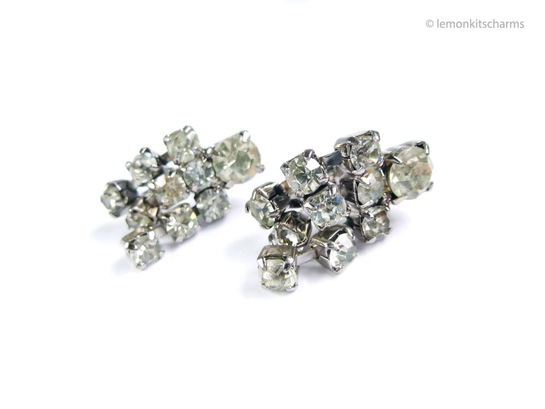 Vintage 1960s Clear Rhinestone Fringe Pierced Earrings, er2672-ci (Category: Earrings) located in Singapore. Submitted by lemonkitscharms (Listing ID 1378459054, Image 3). Description: Vintage 1960s Clear Rhinestone Fringe Earrings, for pierced ears. Aging to the rhinestones with clouding and/or darkening. Metal is in very good condition. These rarely come in pierced forms, they usually are clip/screw-backs. Pretty clever how they added posts ont
