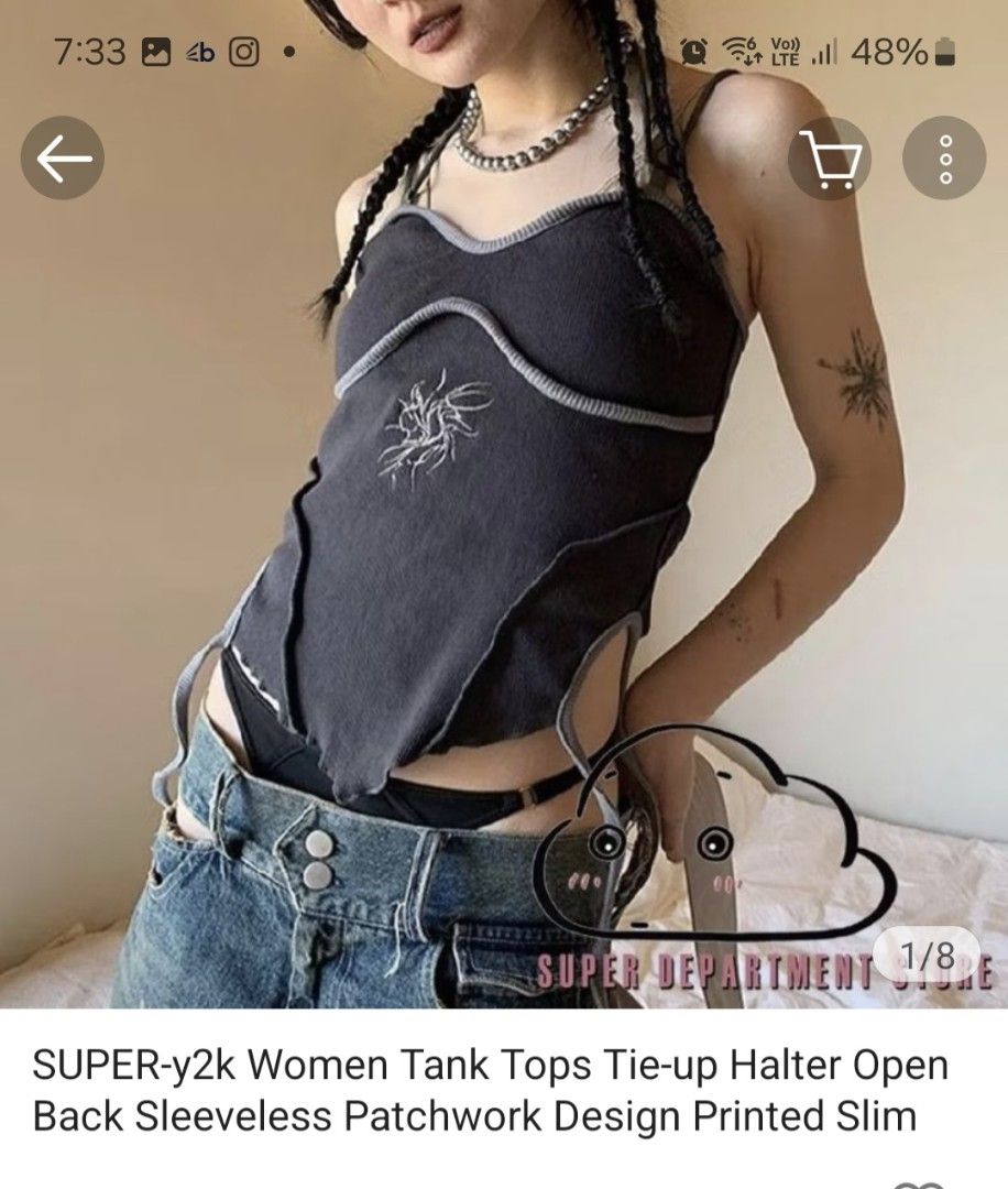 Y2K Halter Tank Top (Category: Sleeveless) located in Singapore. Submitted by jaywolfiee (Listing ID 1378348438, Image 1). Description: - Y2K style tank top - Unique patchwork design - Tie-up halter neck - Open back - Sleeveless - Slim fit - Perfect for a trendy and edgy look - Never used before buy more to nego. top up for mailing.