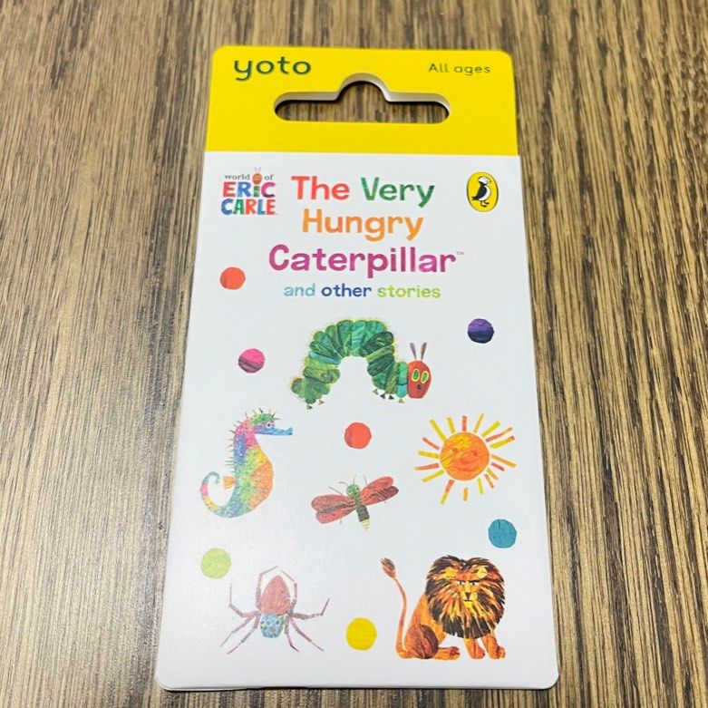 Yoto The Very Hungry Caterpillar Audio Card (Category: Infant Playtime) located in Singapore. Submitted by savvy_purchases (Listing ID 1378409203, Image 1). Description: This Yoto audio card features 'The Very Hungry Caterpillar and Other Stories' by Eric Carle. It's designed for use with a Yoto Player. - 36-minute audio recording of classic children's stories. - Perfect for young listeners! - https://uk.yotoplay.com/products/the-very-hungry-cate