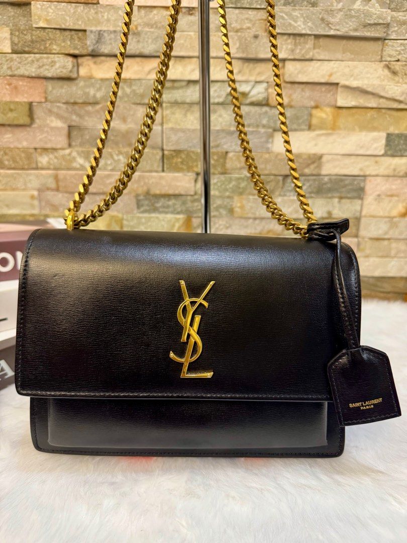 YSL Sunset small (Category: Luxury Bags & Wallets) located in Taguig. Submitted by angelbellaclaire (Listing ID 1378530598, Image 2). Description: Fresh Bag, Fresh Vibes!!! YSL Sunset Small – Classy na, Sulit pa! (9/10) Oozing with elegance pero swak sa kahit anong outfit — office o lakad! 📏 Size: 7.8” x 5.5” x 2.5” 👜 Features: Chain strap, YSL logo, structured leather Inclusion: dustbag, care card, receipt.