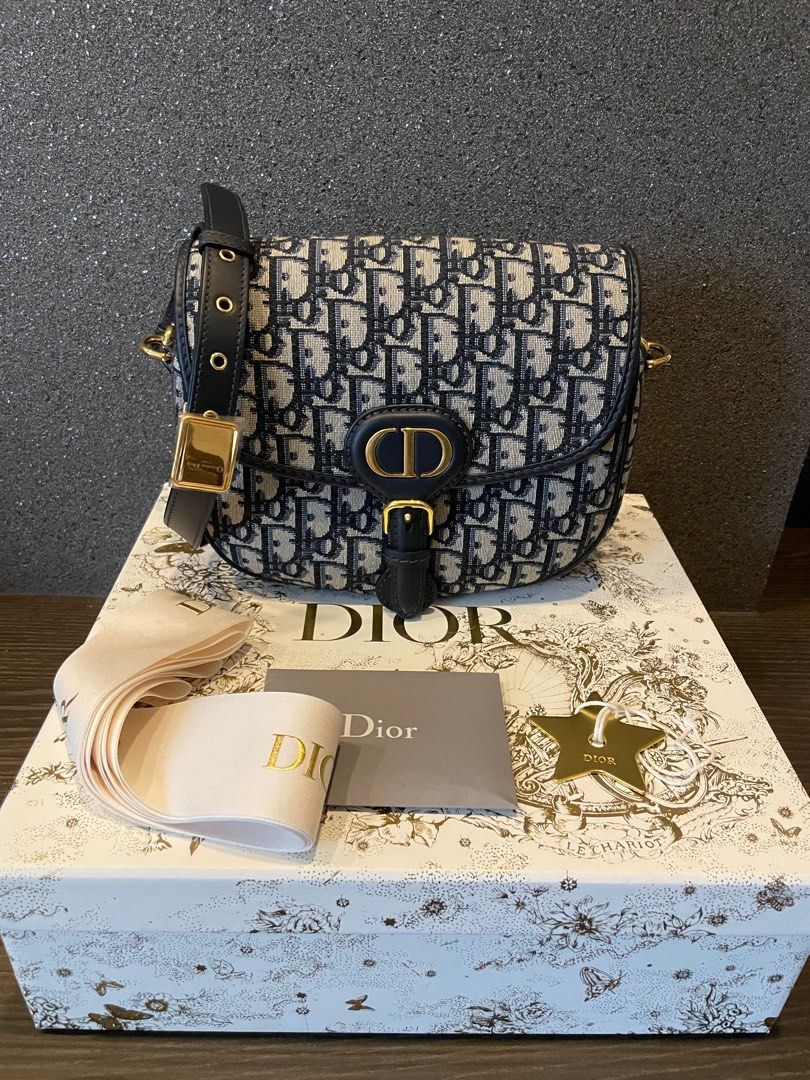 Authentic Christian Dior Bobby Medium bag (Category: Luxury Bags & Wallets) located in Quezon City. Submitted by breakmyfashion (Listing ID 1383826301, Image 1). Description: Comes in full set with authenticity card, receipt, box, paperbag and dust bag. .
