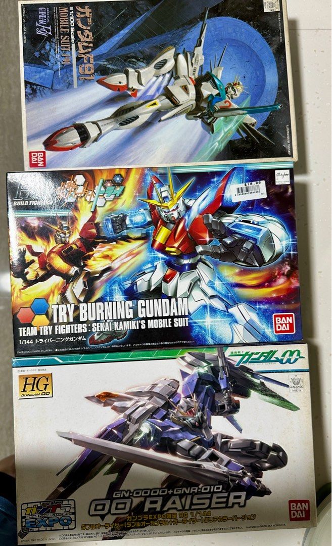Bandai HG 1/144 OO Raiser, Try Burning Gundam, F91 Model Kits (Category: Gundam Model Kits) located in Singapore. Submitted by stingray456 (Listing ID 1383774670, Image 3). Description: $50 for all 3 models - Gunpla model kit bundle for sale. - Includes: - HG 1/144 OO Raiser (Gundam 00) - Try Burning Gundam - Gundam F91 - All kits are new and unopened. - Perfect for Gundam enthusiasts and model kit builders. - Get building!.