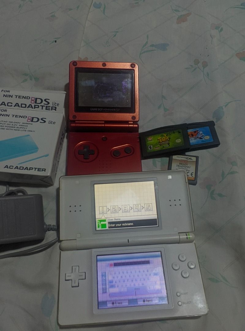 GBA SP/NINTENDO DSLITE (Category: Nintendo) located in Caloocan City. Submitted by thecpselle69302 (Listing ID 1383777079, Image 1). Description: For sale Ptpa admin 🎮 Nintendo DS Lite + GBA SP Bundle – For Restoration / Parts 🔸 DS Lite (EU version) – working, may charger, bottom screen flickers after a while. Case has yellowing due to age. 🔸 GBA SP (AGS-001, US) – untested, no battery, may scratches/dents, and possibly may LCD issue (parang m
