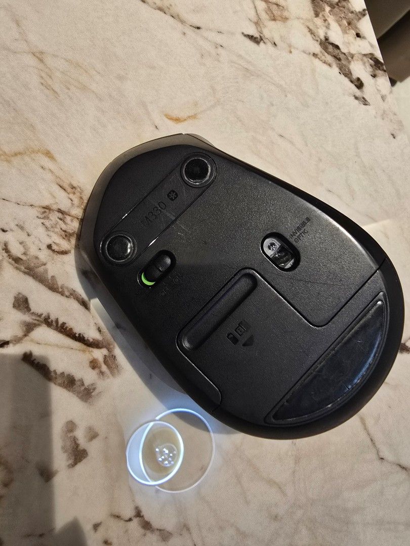 Logitech Wireless Mouse (Category: Mouse & Mousepads) located in Singapore. Submitted by iceblazer93 (Listing ID 1383797684, Image 2). Description: - Used Logitech wireless mouse - Black color - self collect at 521896 - Features a scroll wheel - Shows signs of wear and tear - Fully functional - Ideal for daily tasks.