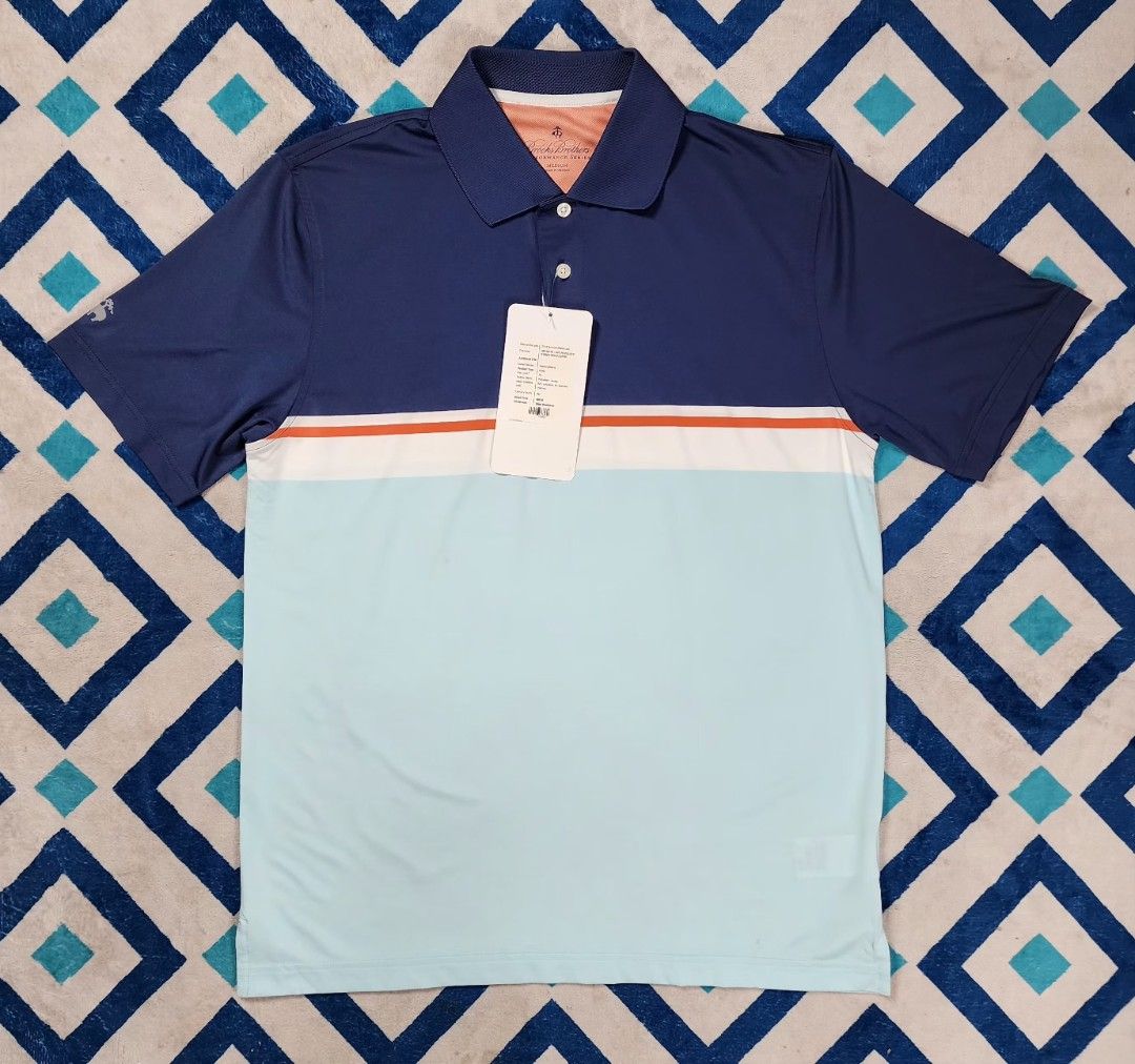 Medium Brooks Brothers Performance Golf Polo Shirt (Category: Activewear) located in Pasay City. Submitted by golfclubtraderph (Listing ID 1383674857, Image 2). Description: For Sale : • Brooks Brothers Performance Golf Polo Shirt Features : • Authentic •Condition: Brand New with Tags •Size: Medium •Material: 100% Polyester •Lightweight and stretchable fabric •Stylish color-blocked design in navy, white, and light blue •Ideal for golf or casual w