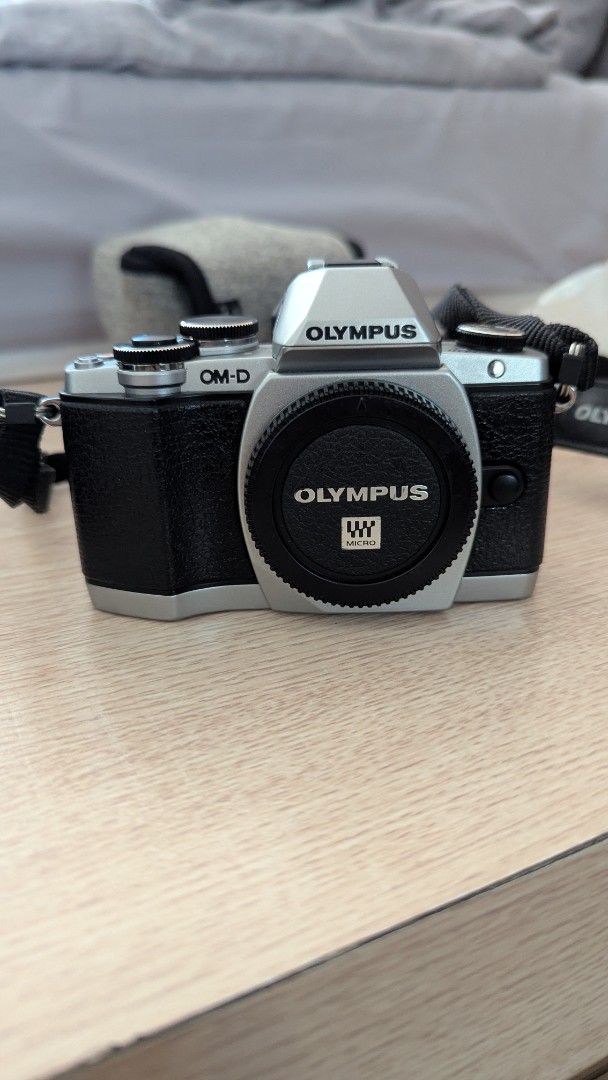Olympus OMD E-M10 Mk1 micro four thirds camera + 4 lens bundle (Category: Cameras) located in Quezon City. Submitted by cescpistol (Listing ID 1383741965, Image 2). Description: For sale: Olympus OMD E-M10 Mark I with four lenses 1. Olympus 14-42mm kit lens 2. Panasonic 20mm F1.7 ii 3. Panasonic Macro G 30mm 4. Olympus 40-150mm telephoto zoom The two Panasonic lenses sell for over $200 each on the used market, so you're basically getting the tele