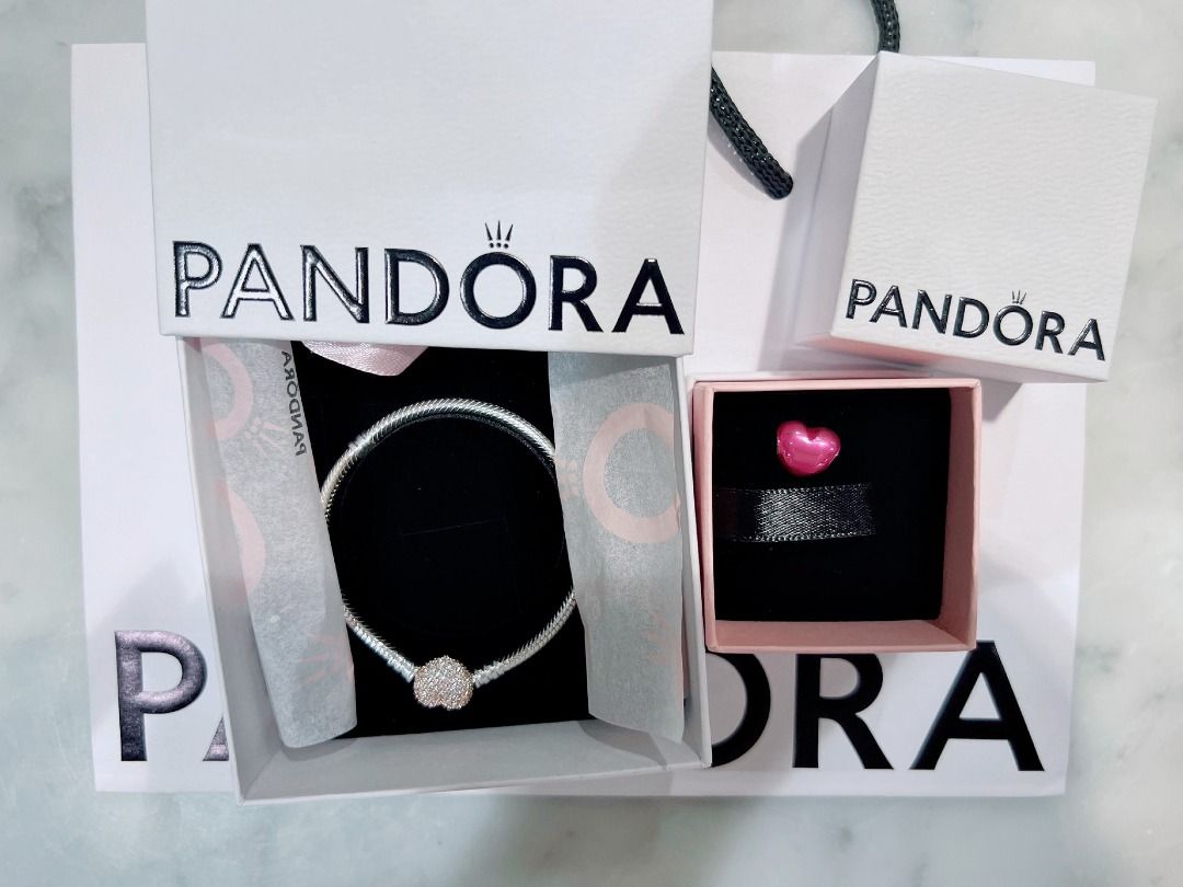 Pandora Bracelet and Charms (Category: Bracelets) located in Valenzuela. Submitted by candice017 (Listing ID 1383786058, Image 1). Description: PM me for actual photos. Comes with Box. Length: 16CM. As advised by Pandora mas okay daw yung mejo tight saken since it will eventually loosen. But I haven’t been using it. But need na ng cleaning. Free po ang cleaning to any Pandora branch..