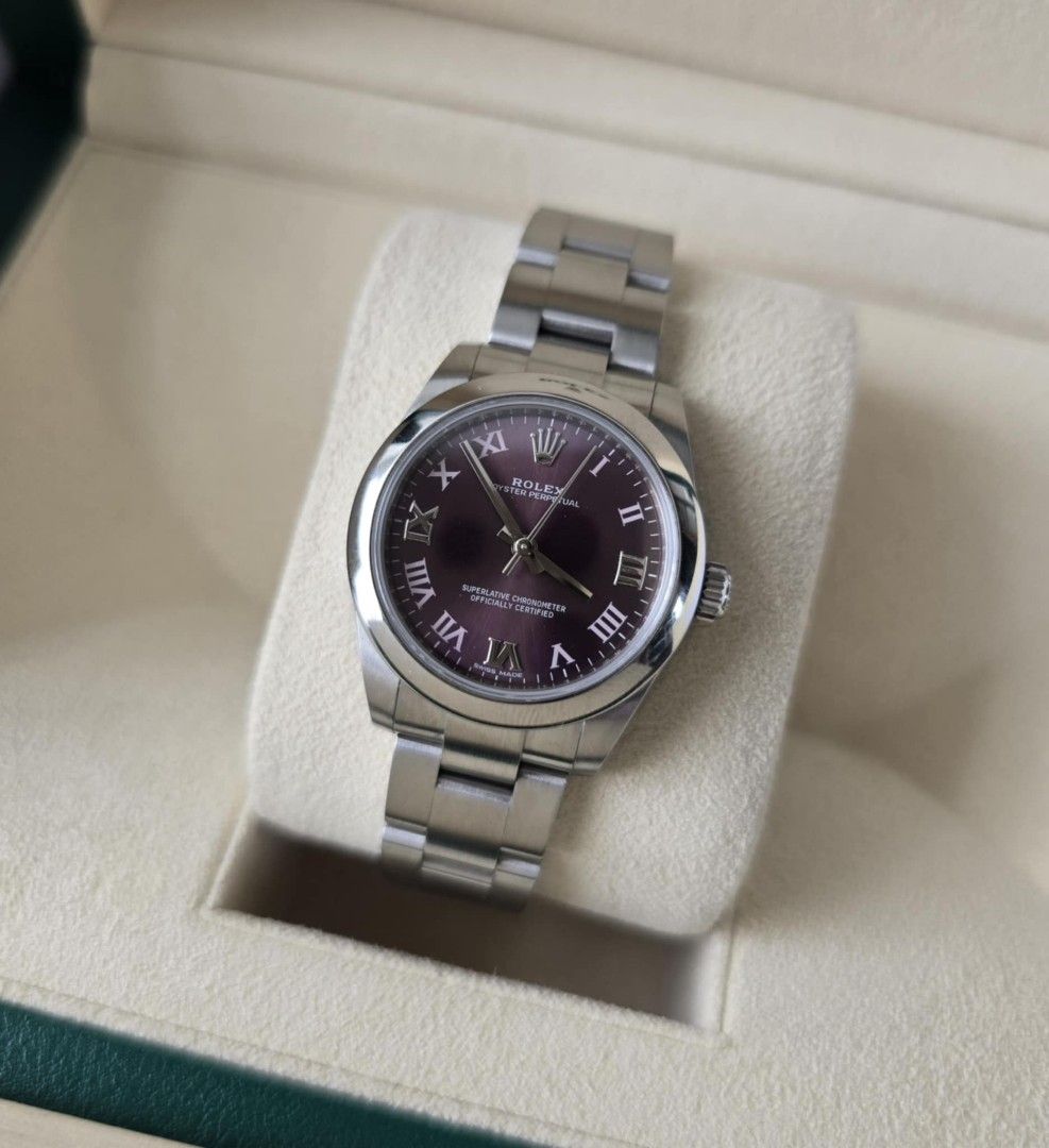 Rolex OP31 Grape (Category: Luxury Watches) located in Mandaluyong City. Submitted by 88nac (Listing ID 1383777322, Image 1). Description: ☂️☂️ 2019 Rolex OP31 Red Grape 31mm 2019 - Foreign AD 177200 Purple Dial Full set 9.8/10 condition 388k Negotiable PM for inquiries.