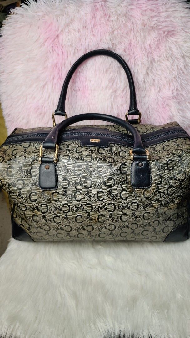 selected bag (Category: Luxury Bags & Wallets) located in Panabo. Submitted by trexiejane20635 (Listing ID 1383795971, Image 1). Description: old pvc barrel bag rare find bag slightly used condition.