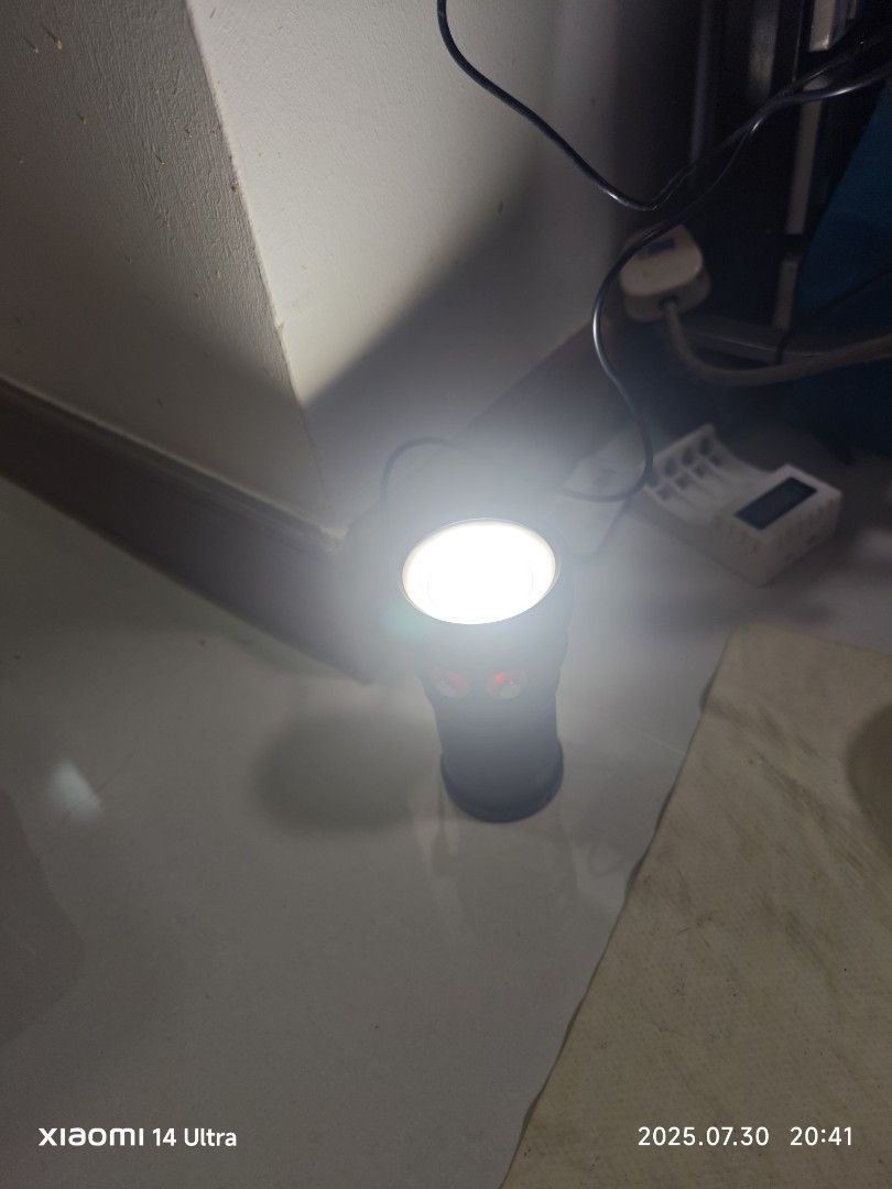 Touchlight (Category: Other Electronics) located in Singapore. Submitted by silencekillers (Listing ID 1383796470, Image 3). Description: Found this item at my company warehouse my supervisor ask me to sell it off. Come with all the accessories but please note there are no battery inside the touchlight but you can buy it online. Interested buyer text me. .