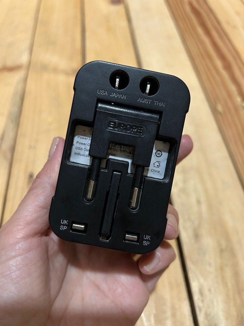 Universal Travel Adapter (Category: Electrical, Adaptors & Sockets) located in Lipa City. Submitted by lifestyled (Listing ID 1383679237, Image 3). Description: universal travel adapter with a built-in surge protector. It allows you to use your electronic devices in various countries with different plug types and voltage standards. It features a “CE” marking, indicating conformity with health, safety, and environmental protection standards within