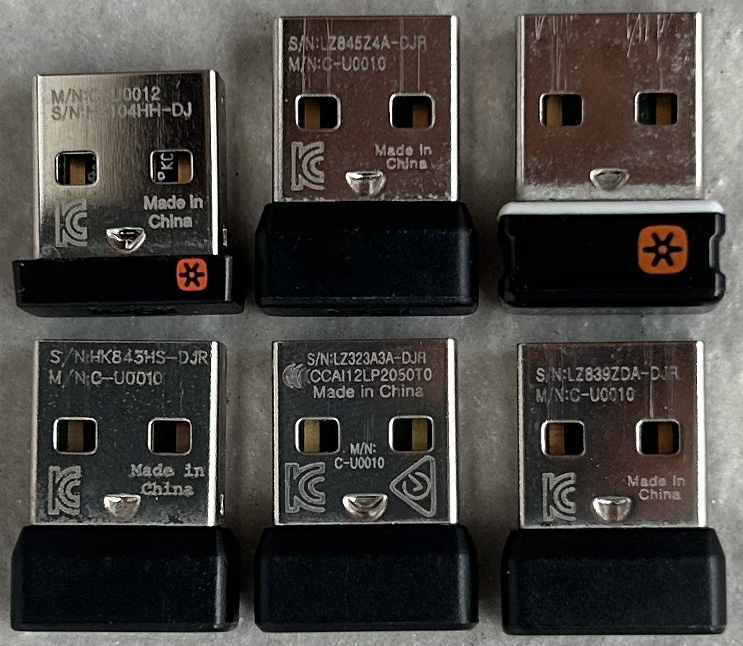 USB dongle receivers connect multiple Logitech wireless devices (like ...