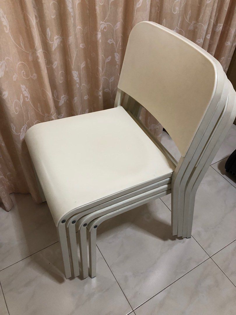 White stackable chairs (Category: Chairs) located in Singapore. Submitted by ong28582 (Listing ID 1383814927, Image 1). Description: Nice stackable chairs (set of 4) for sale .