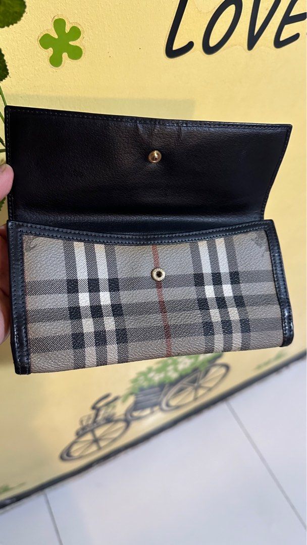 Authentic Burberry Long Wallet (Category: Luxury Bags & Wallets) located in Las Pinas. Submitted by marshmallowmax (Listing ID 1383891325, Image 2). Description: Guaranteed Authentic! Still in good condition with minimal tear on side.. refer photo.. no more inclusions.