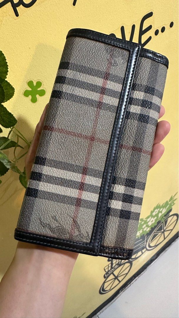 Authentic Burberry Long Wallet (Category: Luxury Bags & Wallets) located in Las Pinas. Submitted by marshmallowmax (Listing ID 1383891325, Image 1). Description: Guaranteed Authentic! Still in good condition with minimal tear on side.. refer photo.. no more inclusions.