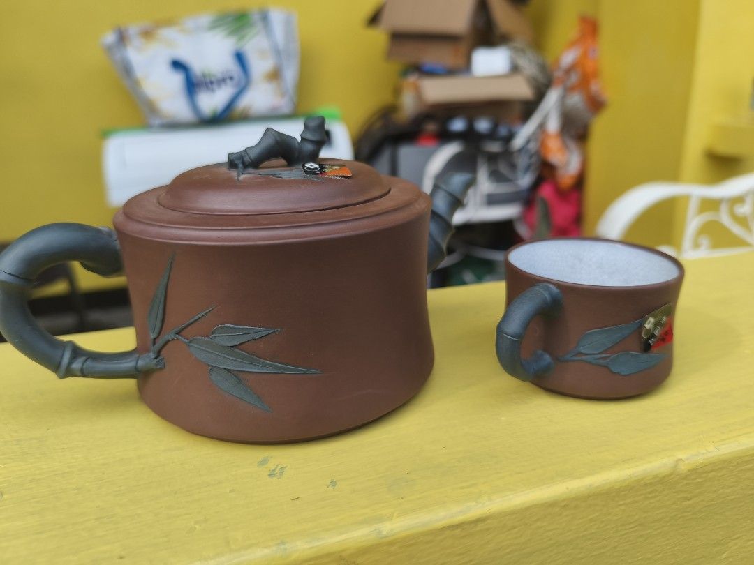 Chinese Yixing Teapot 250cc with teacup (Category: Coffee & Tea Tableware) located in Muntinlupa City. Submitted by prime_finder (Listing ID 1383989679, Image 1). Description: Chinese Yixing Teapot 250cc paired with teacup authentic signed by the potter.