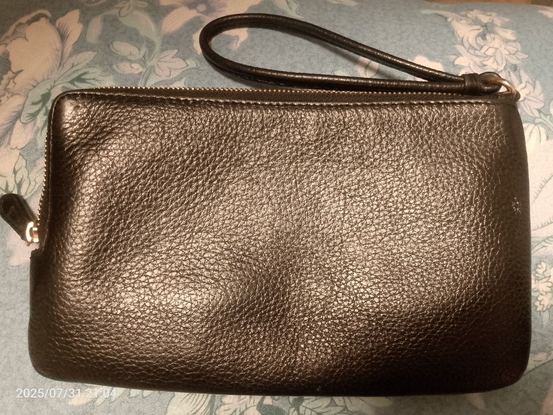 COACH Wristlet (Category: Wallets & Card holders) located in Tagum. Submitted by ms.jopz (Listing ID 1383999328, Image 3). Description: COACH Wristlet -Original -double zip -no box, no tags, no papers -negotiable -with minor flaws MOP - GCASH MOD - J&T.