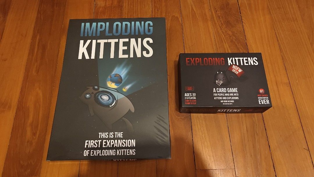 Exploding Kittens Card Game & Imploding Kittens Expansion (Category: Board Games & Puzzles) located in Singapore. Submitted by jctheavenger (Listing ID 1384033275, Image 1). Description: - Like new Exploding Kittens card game. - Includes the BNIB sealed Imploding Kittens expansion pack..