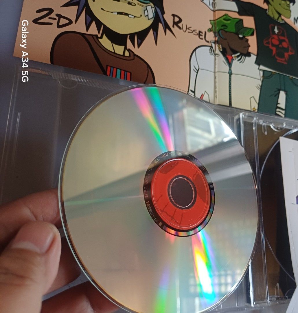 Gorillaz G sides CD (Category: CDs & DVDs) located in Calamba. Submitted by ariavictoria16 (Listing ID 1383976371, Image 3). Description: ❗ Please Read Before Buying ❗ 📀 Items have not been tested or played — I no longer have a cassette or CD player. 📸 Check all photos carefully. Tap to view full images and see any flaws. 🪶 These have been stored on open bookshelves for decades, so please manage your expectations. 📌 Read the listing thoroughl
