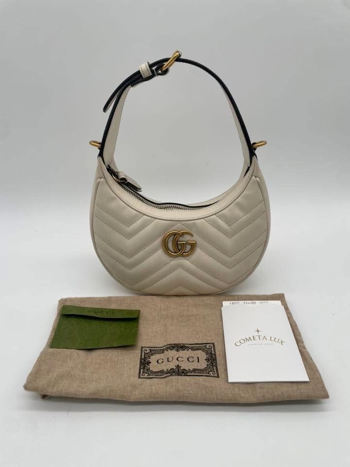 Gucci Marmont Half moon (Category: Luxury Bags & Wallets) located in Quezon City. Submitted by jmscm (Listing ID 1383913719, Image 1). Description: Gucci Marmont Half Moon 2 way bag Guaranteed Authentic Rank A Condition Inclusion: Dust Bag, Booklet, Box and Paper Bag .
