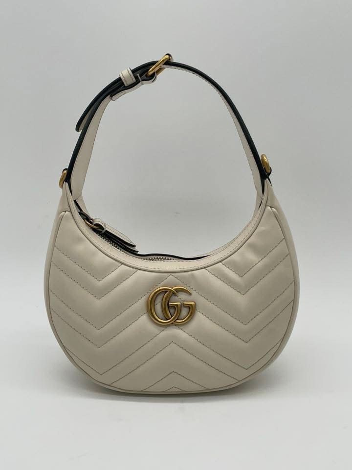 Gucci Marmont Half moon (Category: Luxury Bags & Wallets) located in Quezon City. Submitted by jmscm (Listing ID 1383913719, Image 3). Description: Gucci Marmont Half Moon 2 way bag Guaranteed Authentic Rank A Condition Inclusion: Dust Bag, Booklet, Box and Paper Bag .