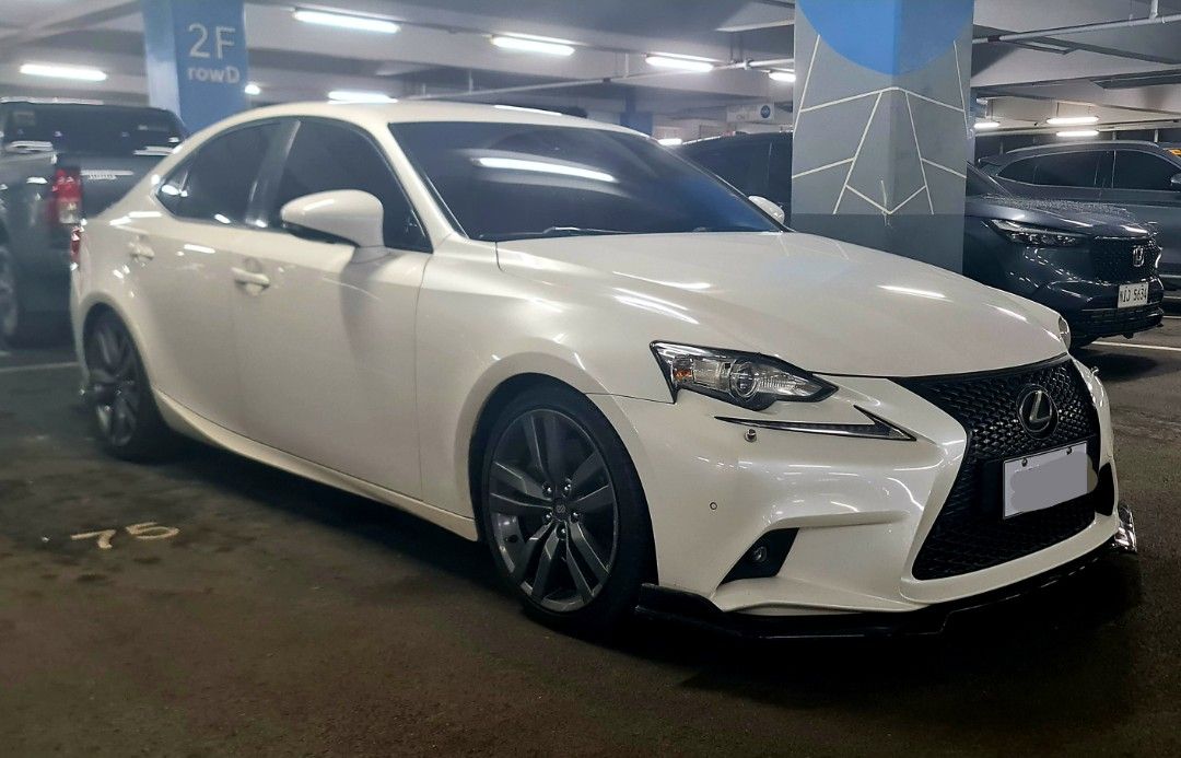 Lexus IS350 loaded Auto (Category: Used Cars) located in Quezon City. Submitted by jt.pangan (Listing ID 1383990107, Image 2). Description: 2014 Lexus IS350 Loaded 3.5L V6 Pearl white 50T kms only (ORIGINAL, UNTAMPERED) Money back guarantee Automatic with paddle shift Very fresh in and out All features working perfeclly No fault 100% NEVER FLOODED 100% No accident history No issues whatsoever Orig 18 inch Enkei Mags Orig Tein S-tech springs Orig 