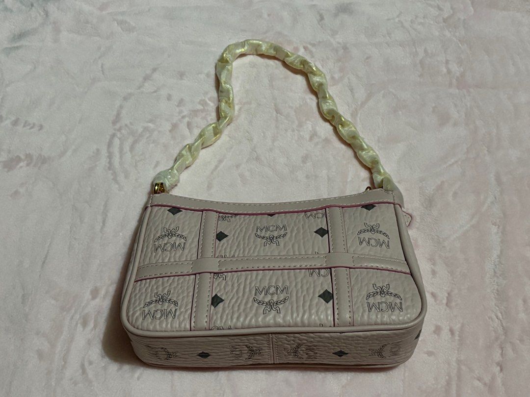 MCM Aren Shoulder Bag In Visetos (Category: Luxury Bags & Wallets) located in Las Pinas. Submitted by glittermoon26 (Listing ID 1384035397, Image 1). Description: Selling my MCM Aren Shoulder Bag In Visetos for super low price Pristine condition - chain and long strap were and is still covered to prevent scratches. Inclusions: long strap, care card and dust bag. No more box, Rfs: madaming bags, need magbawas.