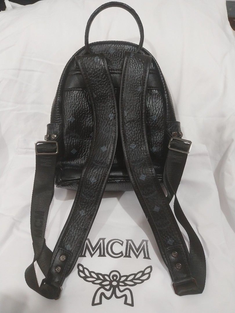 MCM Stark Side Studs (Category: Backpacks) located in Quezon City. Submitted by jonvee2000 (Listing ID 1383966271, Image 3). Description: preloved small in size turnable screw/ykk zipped.