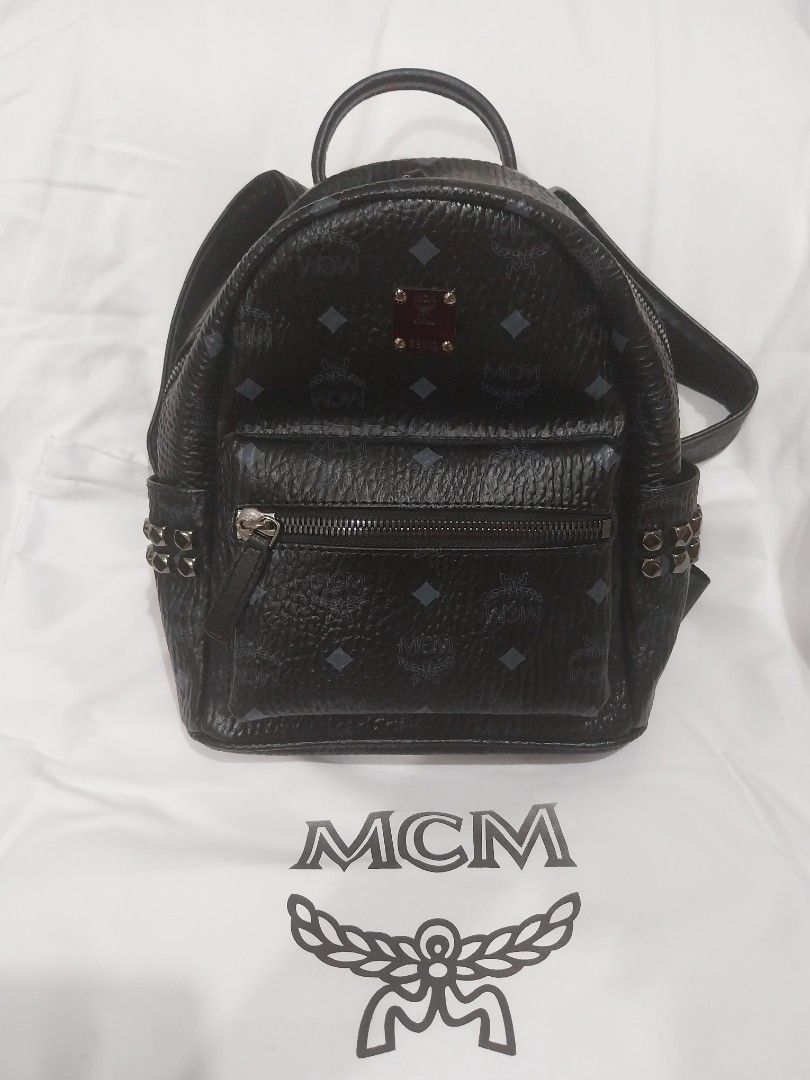 MCM Stark Side Studs (Category: Backpacks) located in Quezon City. Submitted by jonvee2000 (Listing ID 1383966271, Image 1). Description: preloved small in size turnable screw/ykk zipped.