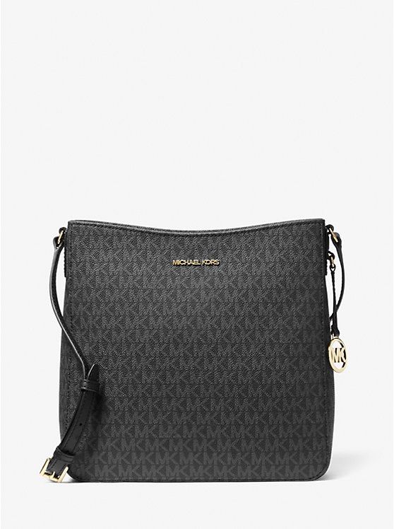 Michael Kors Jet Set Large Messenger Bag (Category: Luxury Bags & Wallets) located in Taguig. Submitted by blissdreana (Listing ID 1384024170, Image 2). Description: Michael Kors Jet Set Large Messenger Bag Crafted from coated canvas and printed with MK iconic initials , the Jet Set Travel messenger offers a timeless approach to accessorizing. The sleek silhouette fastens with a top-zip opening, while the adjustable shoulder strap promises a perf