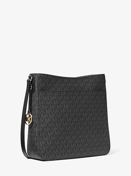 Michael Kors Jet Set Large Messenger Bag (Category: Luxury Bags & Wallets) located in Taguig. Submitted by blissdreana (Listing ID 1384024170, Image 3). Description: Michael Kors Jet Set Large Messenger Bag Crafted from coated canvas and printed with MK iconic initials , the Jet Set Travel messenger offers a timeless approach to accessorizing. The sleek silhouette fastens with a top-zip opening, while the adjustable shoulder strap promises a perf