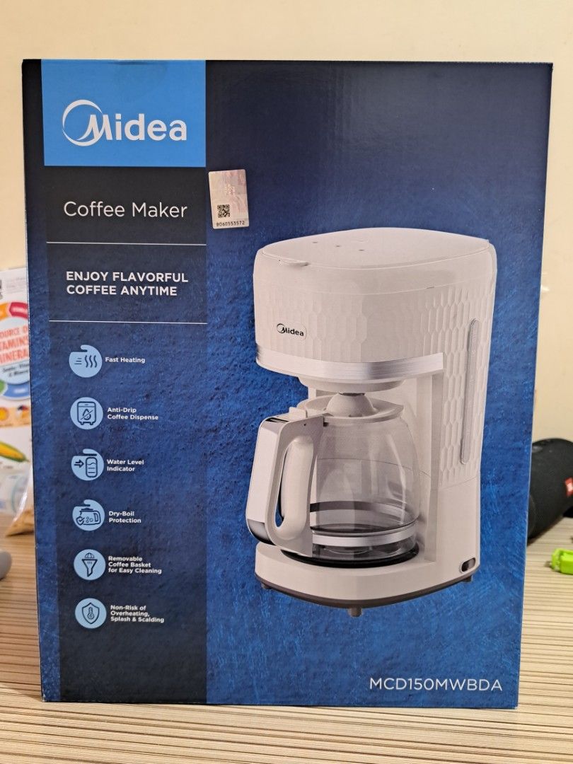 Midea Coffee Maker MCD150MWBDA (Category: Coffee Machines & Makers) located in Pasay City. Submitted by pailomaytinn (Listing ID 1383865804, Image 3). Description: Brand new coffee maker. Sealed in box. Capacity: 12 Cups Color: Apricot RFS: Not coffee drinkers Features: Easy view water window Removable basket with nylon filter High quality glass jar Power on/off indicator Automatic switch off.