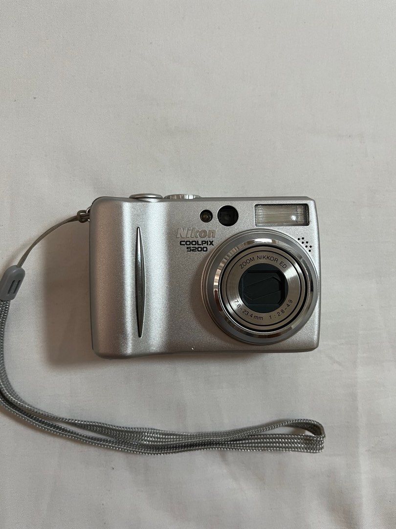 Nikon Coolpix 5200 DigiCam (Category: Cameras) located in Manila. Submitted by shopforless.com (Listing ID 1383956021, Image 1). Description: Almost like brand new. Comes with all inclusions: charger, battery, cords, box and manual. Will also give a free 2GB SD card (the camera can only handle up to 2GB SD cards). Body condition: 10/10 like brand new talaga RFS: I want to upgrade but this cam is hard to let go 🥹 .