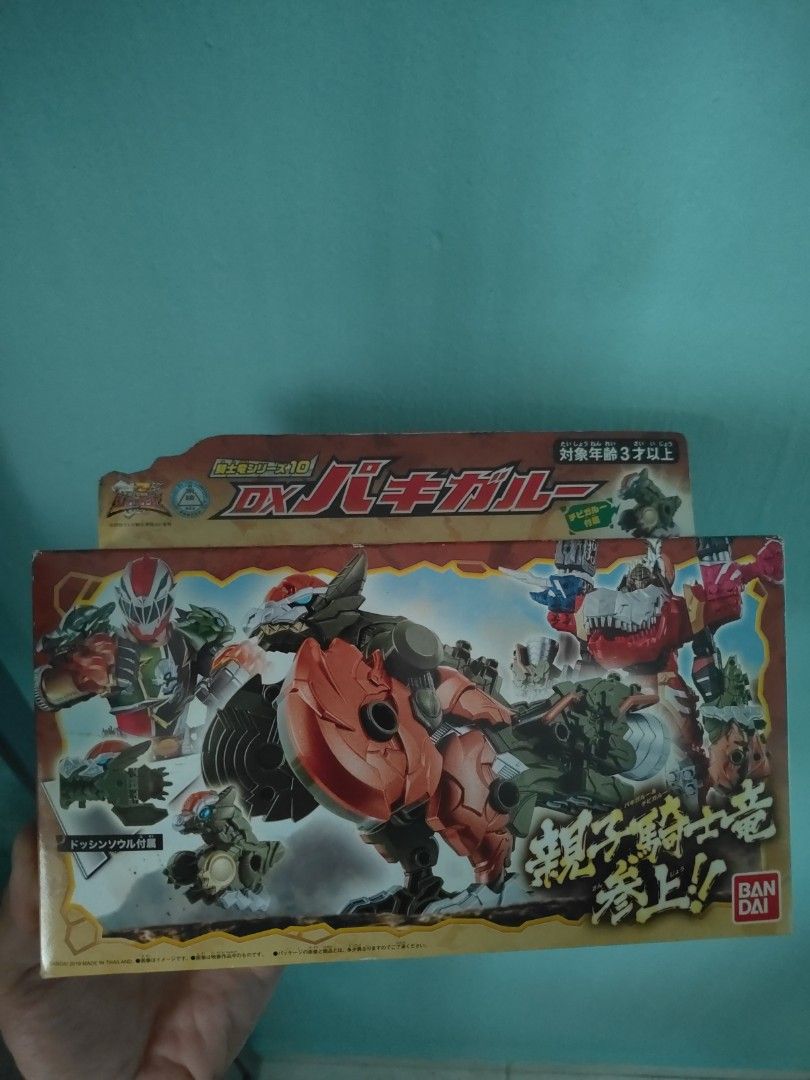Sentai Ryusoulger Bandai DX Pachigaru Action Figure (Category: Toy Figures) located in Singapore. Submitted by zzetzz (Listing ID 1383892352, Image 1). Description: - Brand new, unopened Bandai DX Pachigaru action figure. - Features various characters (as shown on box). - Recommended for ages 3+. - Perfect for collectors and fans..