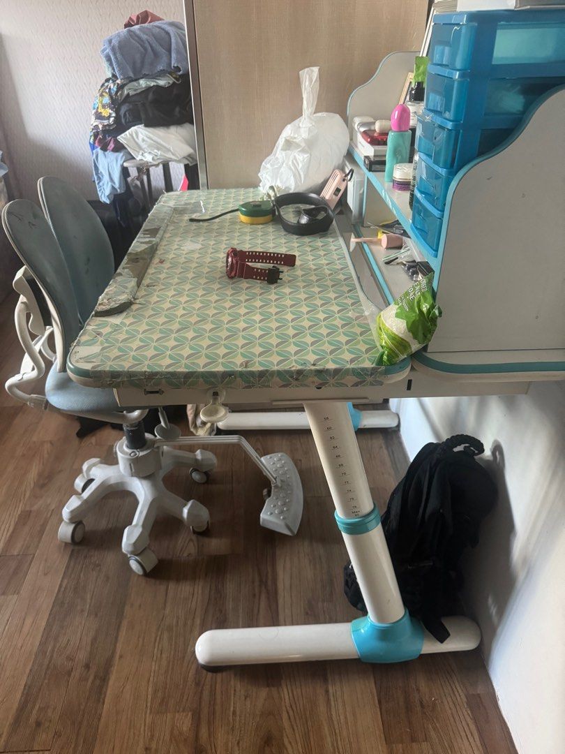Study table (Category: Tables & Sets) located in Singapore. Submitted by modehaus01 (Listing ID 1383945402, Image 1). Description: Used for 5 years still good condition Abit stain on the chair .