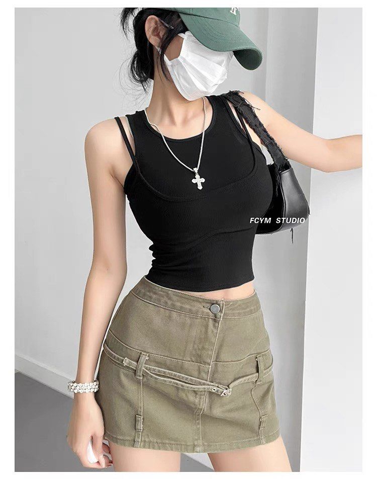 🖤 4 COLORS: y2k Double Layered Sleeveless Spag Tank Knit Top (Category: Sleeveless) located in Singapore. Submitted by nylirehswong (Listing ID 1378697013, Image 3). Description: NEW IN 🔥 Exclusively curated here! Blogshop inspired. Ft a sultry hypebeast streetstyle 2 layered spag cami top. Comfy ribbed cotton knit. Highly stretchable, non-sheer. Colours avail: 1. Classic black 2. Dark Grey 3. Sky blue 4. Classic white FREESIZE (fits XXXS-M): P