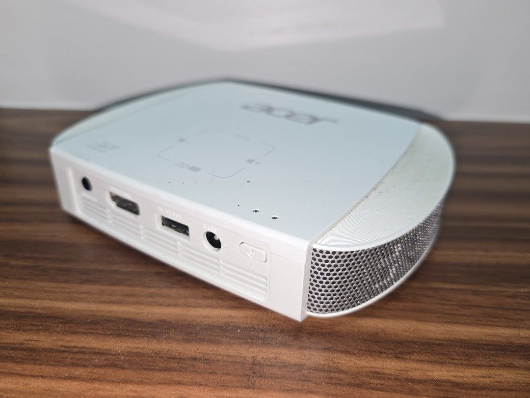ACER MINI PROJECTOR C205 (Category: Projectors) located in Quezon City. Submitted by bravedragon.3db54d (Listing ID 1378602657, Image 3). Description: Would like to sell it since i do not know how to fix the white dots that appear on the projected image. Says in youtube that i have to replace the dmv chip, which i don'r know how to. but there might be a chance that it can be resolved by just cleaning the dmv chip as well. i'll also throw in the a