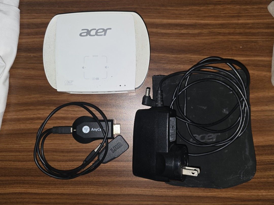 ACER MINI PROJECTOR C205 (Category: Projectors) located in Quezon City. Submitted by bravedragon.3db54d (Listing ID 1378602657, Image 1). Description: Would like to sell it since i do not know how to fix the white dots that appear on the projected image. Says in youtube that i have to replace the dmv chip, which i don'r know how to. but there might be a chance that it can be resolved by just cleaning the dmv chip as well. i'll also throw in the a
