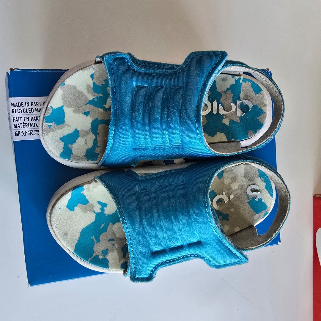 Adidas Sandals - Size 6K (Category: Babies & Kids Fashion) located in Singapore. Submitted by patriciawen2212 (Listing ID 1378705117, Image 1). Description: - Adidas sandals - Excellent condition - Size 6K - Vibrant blue color - Unique camouflage pattern on insole - Comes with original box.