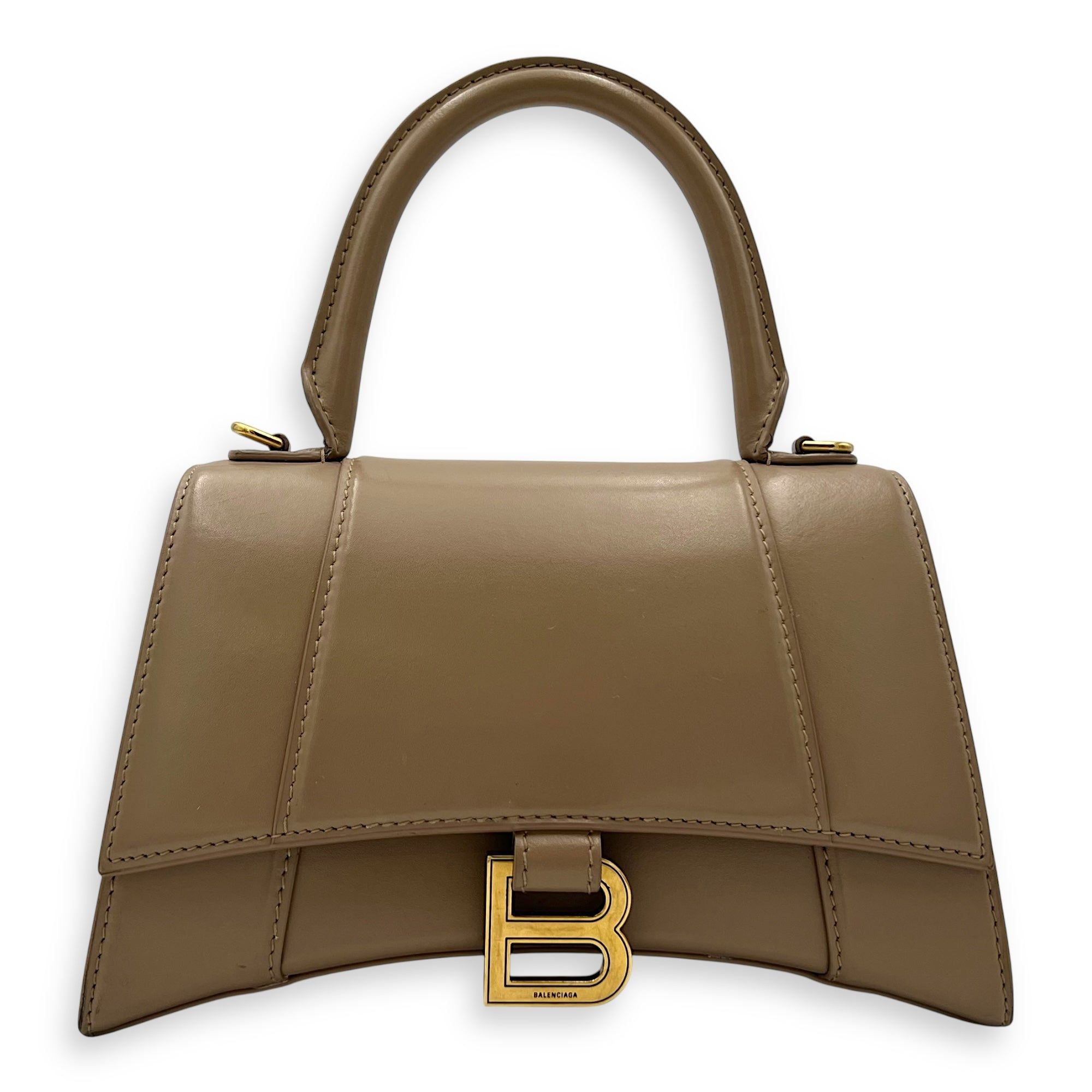 Balenciaga Hourglass Small Beige Top Handle Bag in Calfskin, Gold hardware (Category: Bags & Wallets) located in Singapore. Submitted by carousellluxury (Listing ID 1378629166, Image 1). Description: SKU S2506-006874AN Material Calfskin Size Small Color Beige Hardware Gold Strap Included, detachable and adjustable Dimension (L)22.5cm x (H)15cm x (W)9.5cm Accessories strap Series 593546 9017 U 620318 Circa Est NA Microchipped FALSE PS: Available f