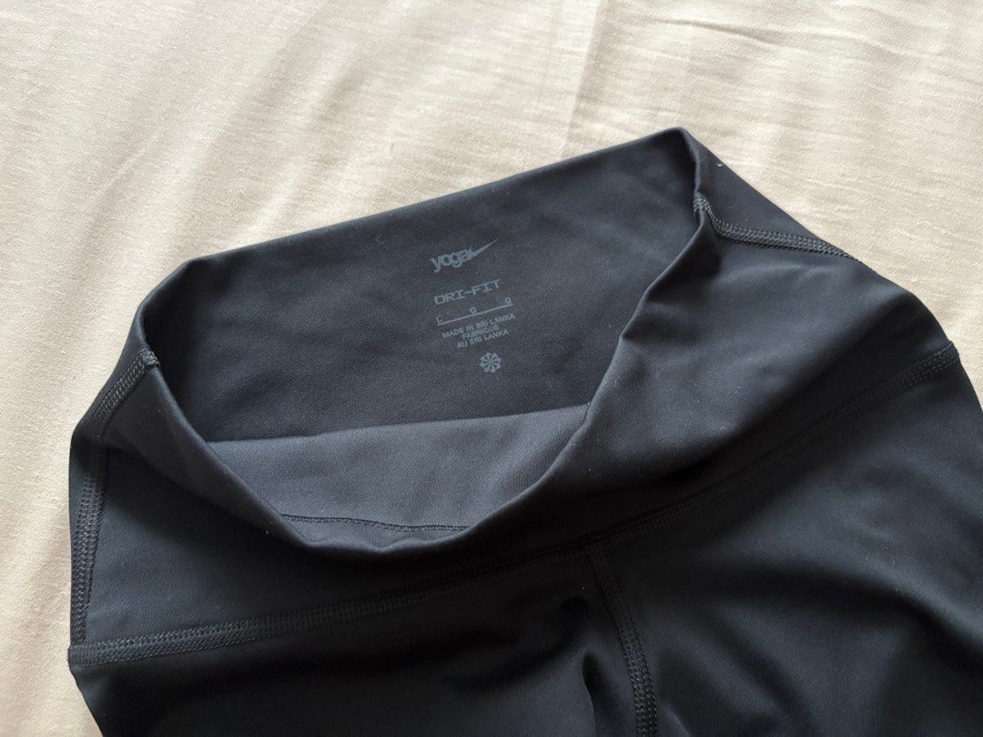 [Brand New] Nike Dri-FIT Yoga Leggings (Black) (Category: Activewear) located in Singapore. Submitted by mentaikocheesefries (Listing ID 1378613472, Image 2). Description: ✧ brand new, no stains/defects/furring ✧ no nego/exchange/refund ✧ meet up at Punggol mrt/+$2.80 NM ✧ product detail: – smooth, buttery and comfortable – vry flattering ✧ product measurement: waist - 29.5cm length - 79cm.