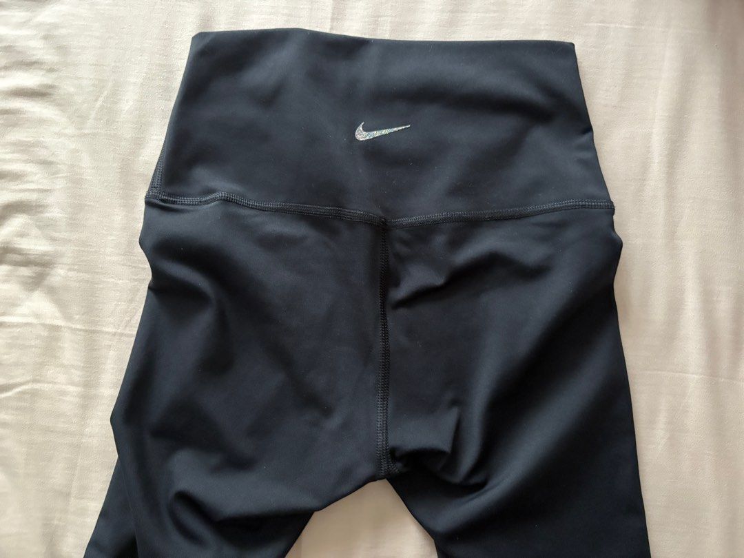 [Brand New] Nike Dri-FIT Yoga Leggings (Black) (Category: Activewear) located in Singapore. Submitted by mentaikocheesefries (Listing ID 1378613472, Image 1). Description: ✧ brand new, no stains/defects/furring ✧ no nego/exchange/refund ✧ meet up at Punggol mrt/+$2.80 NM ✧ product detail: – smooth, buttery and comfortable – vry flattering ✧ product measurement: waist - 29.5cm length - 79cm.
