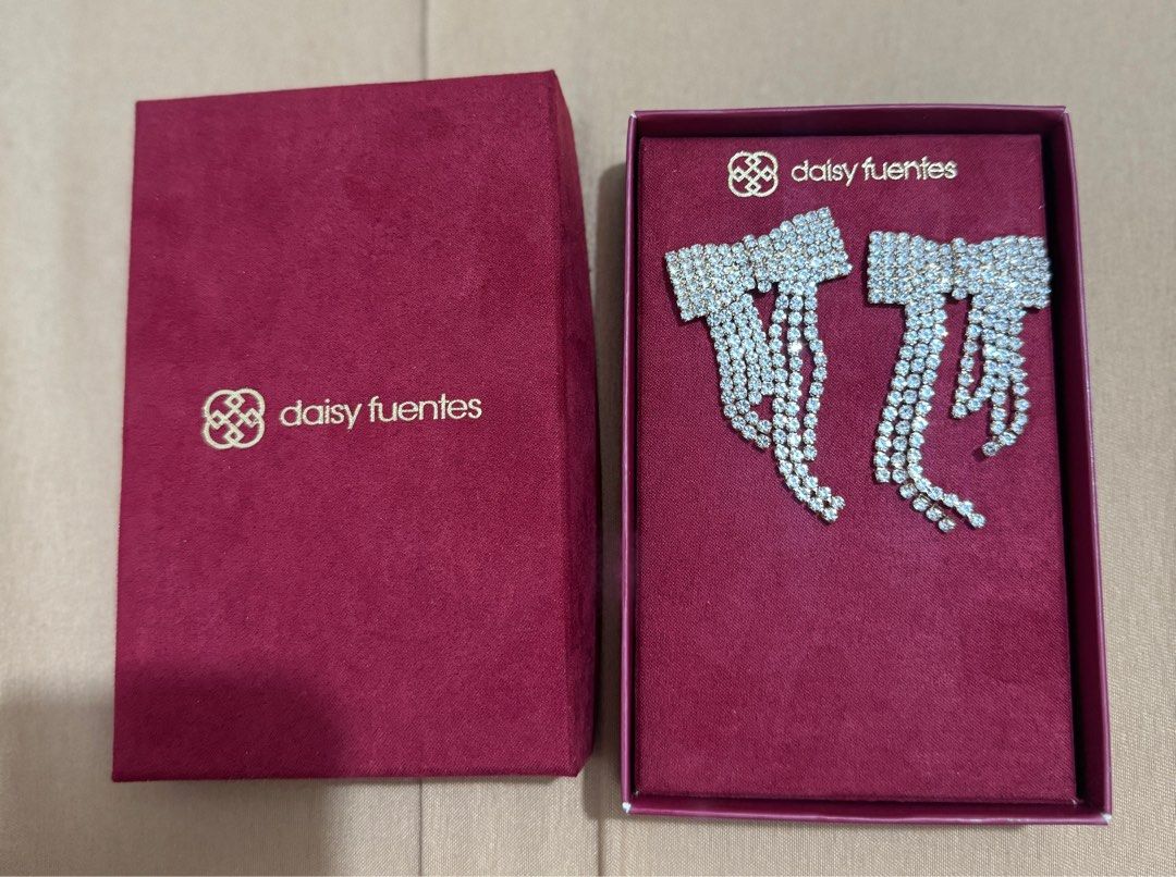 Daisy Fuentes Brand New Earrings (Category: Earrings) located in Makati City. Submitted by meggieeee (Listing ID 1378636295, Image 1). Description: .
