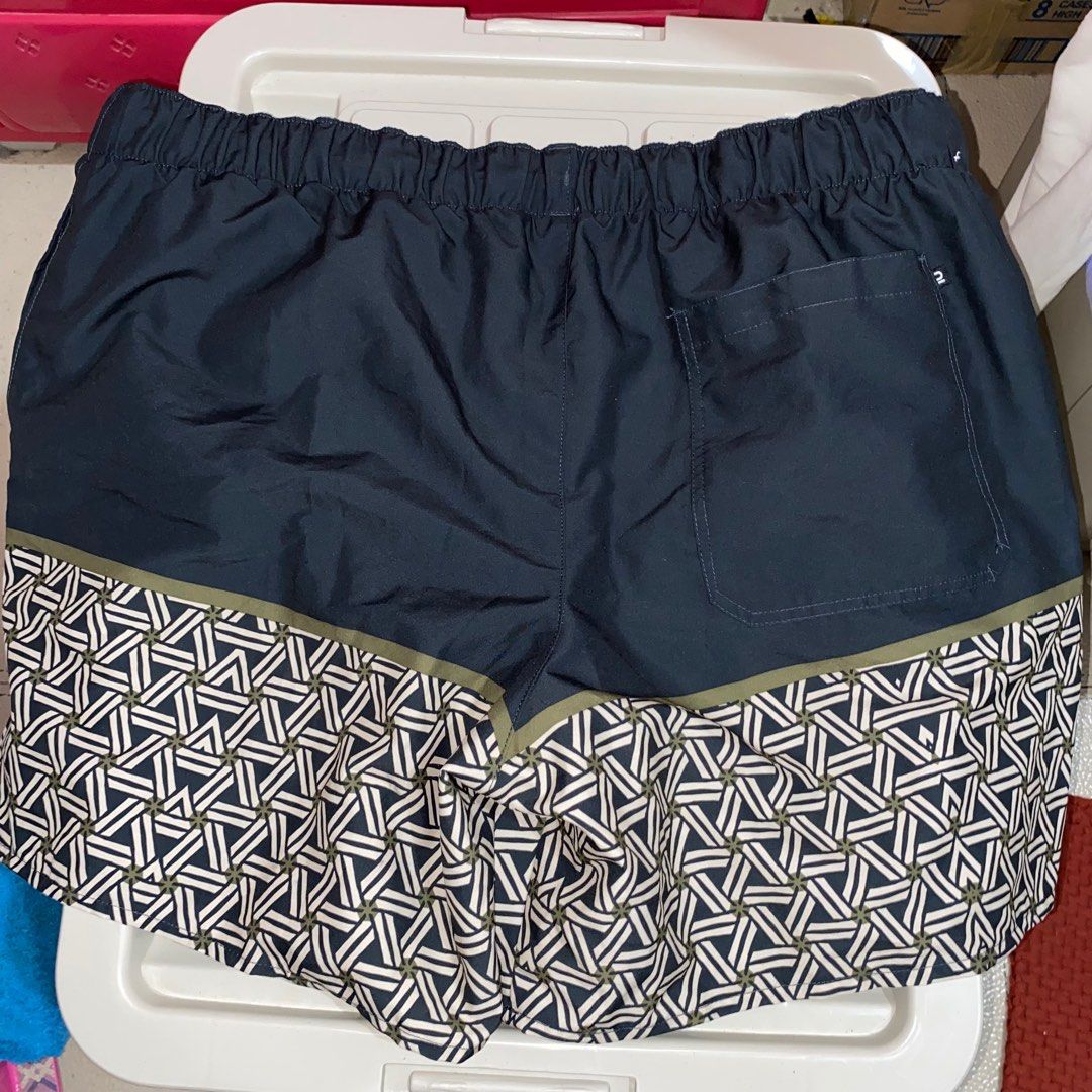 Decathlon Board Shorts 2XL (Olaian) (Category: Swim Trunks & Board Shorts) located in Imus. Submitted by shopfromlilo (Listing ID 1378550291, Image 3). Description: Still with wash tag Used once Too big kay hubby (hindi sinukat sa store) Lalamove ready Molino, Bacoor, Cavite location Payment first #decathlon #decathlonboardshorts #boardshorts.